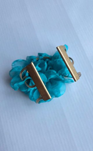 Pulsera pétalos turquesa