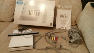Nintendo Wii con mandos y juegos