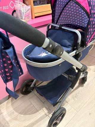 Carrito de muñecas con unicornio