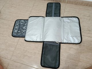 Cambiador portátil para bebé con bolsillo