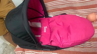 Carrito de bebé rosa