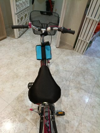 Bicicleta niña rosa y negra