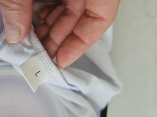 Traje de baño y pareo azul y blanco
