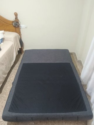 Sofá cama gris tela