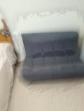 Sofá cama gris tela