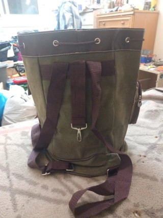Mochila El Corte Inglés verde y marrón