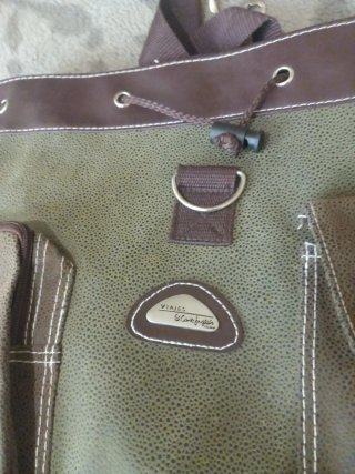 Mochila El Corte Inglés verde y marrón