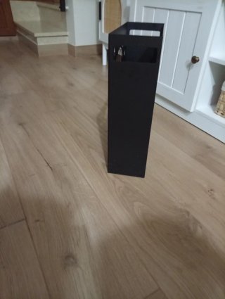 Paragüero de metal negro con diseño