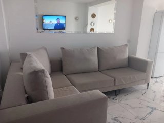 Sofá modular beige de tela