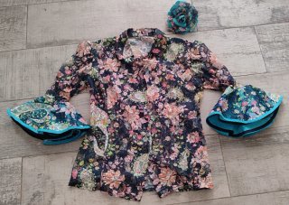 Camisa flamenca y flor a juego
