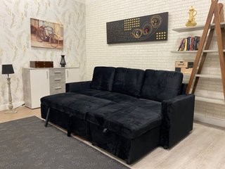 SOFA CAMA NUEVO EN COLOR NEGRO CON BAUL