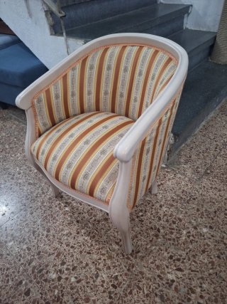 Butaca tapizada estilo clásico
