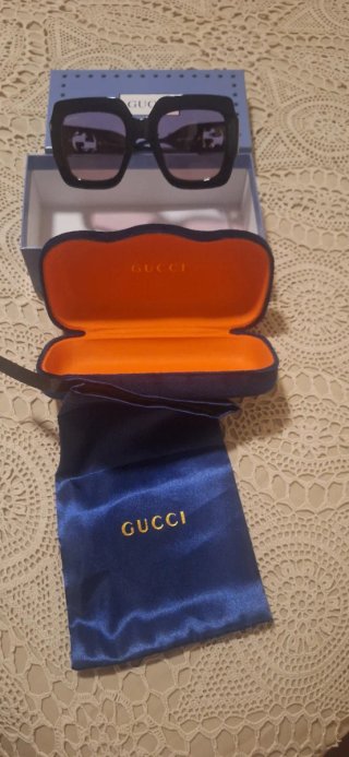 Gafas de sol GUccI negras y doradas