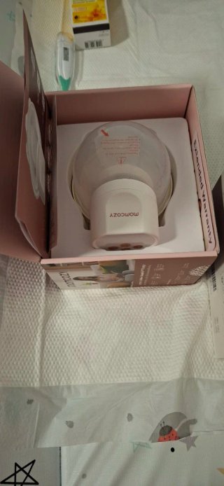 Sacaleches Momcozy y bolsas leche materna