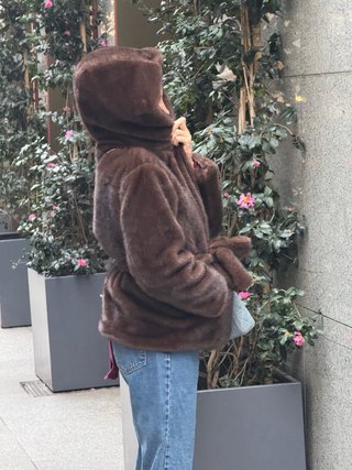 Pelliccia ecologica marrone con cappuccio