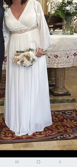 Vestido de novia blanco con chaquetas