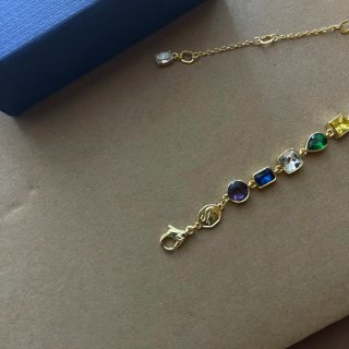 Bracciale Swarovski dorato con pietre colorate