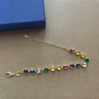 Bracciale Swarovski dorato con pietre colorate