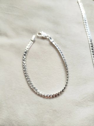 Conjunto collar y pulsera plateados