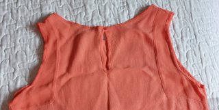 Top color coral sin mangas