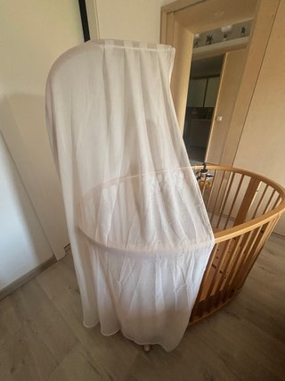 Cuna Stokke ovalada con dosel