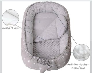 Nido reductor para bebé estrellas gris