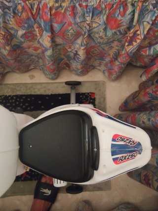 Moto eléctrica infantil blanca