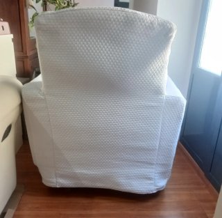 Fundas para sillón blancas.