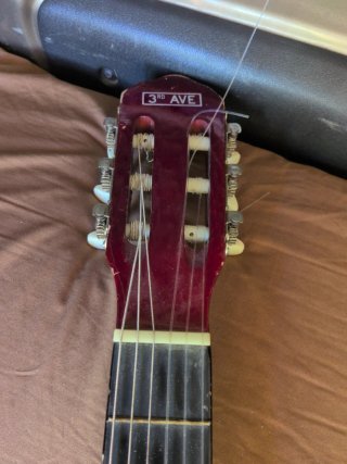 Guitarra de viaje o niño