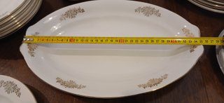 Vajilla porcelana blanca detalles dorados