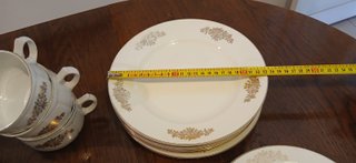 Vajilla porcelana blanca detalles dorados