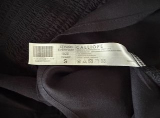 Blusa nera maniche corte a sbuffo scollo quadrato