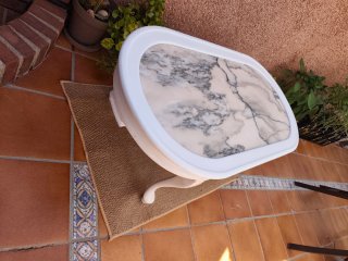 Mesa de centro ovalada con tapa de mármol