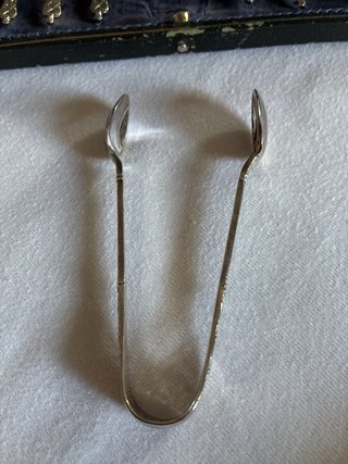 Set 6 cucchiaini + pinza argento
