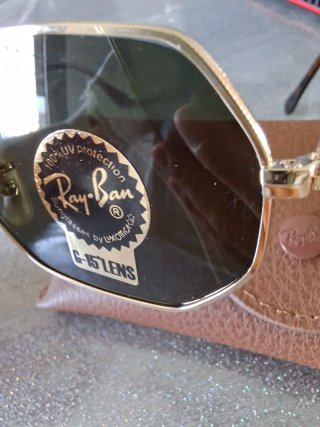 Occhiali da sole Ray-Ban oro e verdi