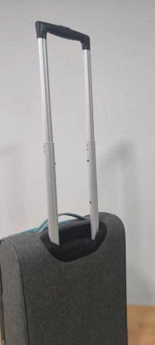 Maleta de viaje pequeña gris y azul