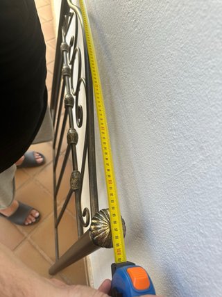 Cabecero de forja negro y dorado