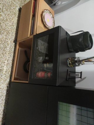 Mueble de madera y terracota