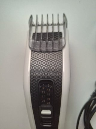 Rasoio elettrico Philips con accessori