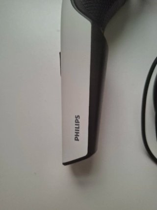 Rasoio elettrico Philips con accessori
