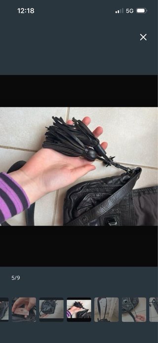 Bolso negro cuero con flecos
