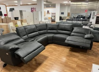 Rinconera de piel gris reclinable