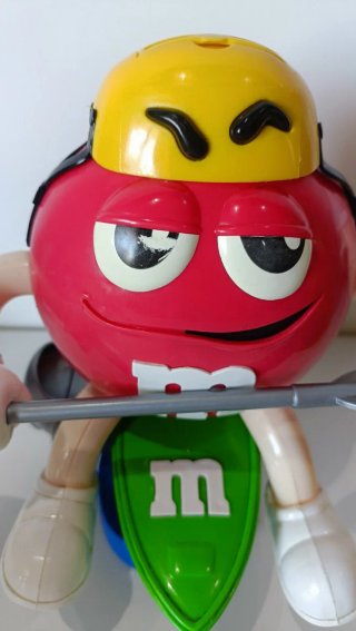 Muñecos M&M's,Lacasitos. moto,piragua,dispensador