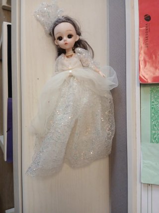 Muñeca articulada musical