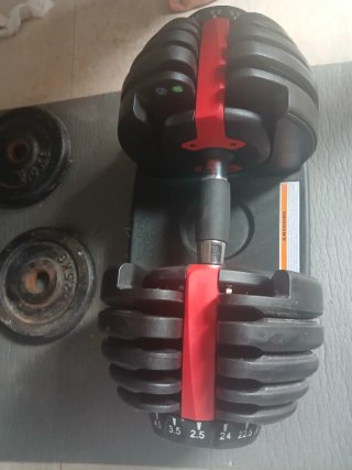 Mancuernas ajustables y equipo de gimnasio
