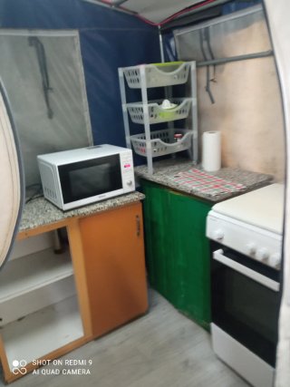 Caravana fija en camping