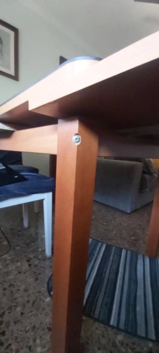 Mesa de comedor de madera con cristal. Extensible