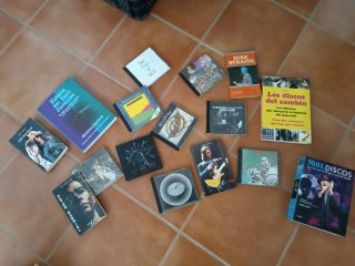 Colección de 13 discos y libros de rock