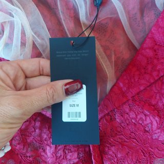 Traje de encaje rojo chaqueta y pantalón