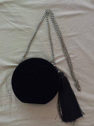 Bolso de fiesta redondo negro de terciopelo